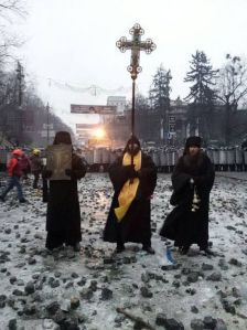 January 2014 Monks stand between police and demonstrators in Kiev
